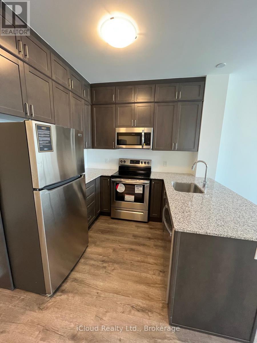319 - 50 Kaitting Trail, Oakville, Ontario  L6M 5N3 - Photo 2 - W13452640