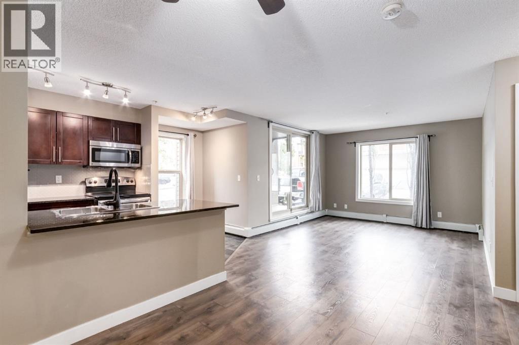 9116, 403 Mackenzie Way SW, Airdrie, Alberta  T4B 3V7 - Photo 3 - A2316527
