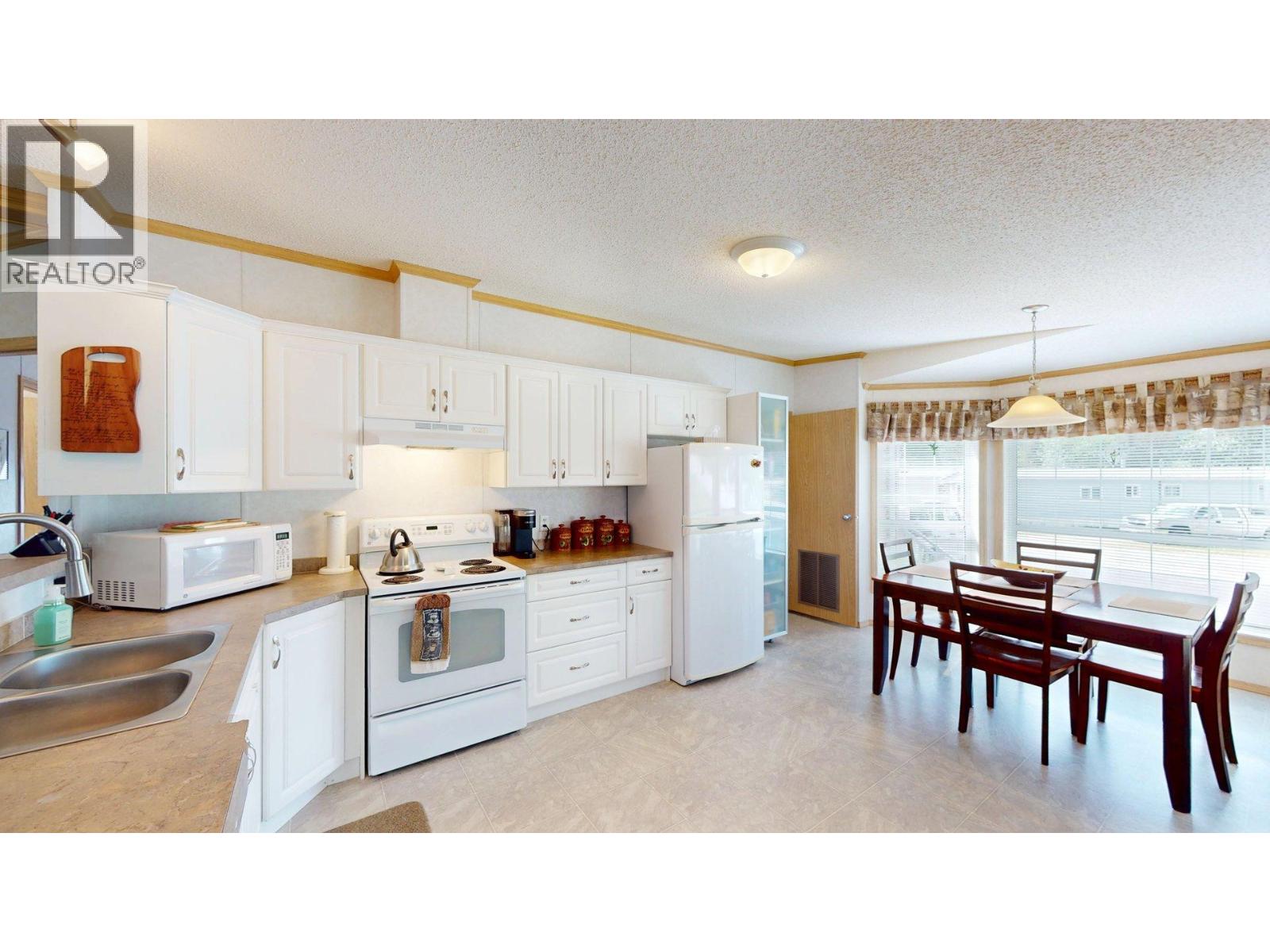 500 16th Avenue Unit# 50, Genelle, British Columbia  V0G 1G0 - Photo 4 - 10390359