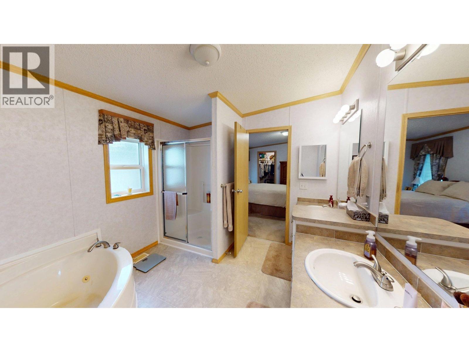 500 16th Avenue Unit# 50, Genelle, British Columbia  V0G 1G0 - Photo 24 - 10390359