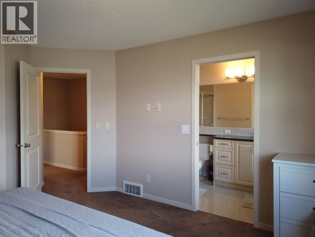 2064 New Brighton Grove Se, Calgary, Alberta  T2Z 1G1 - Photo 15 - A2314403