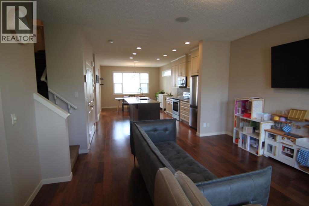 2064 New Brighton Grove Se, Calgary, Alberta  T2Z 1G1 - Photo 4 - A2314403