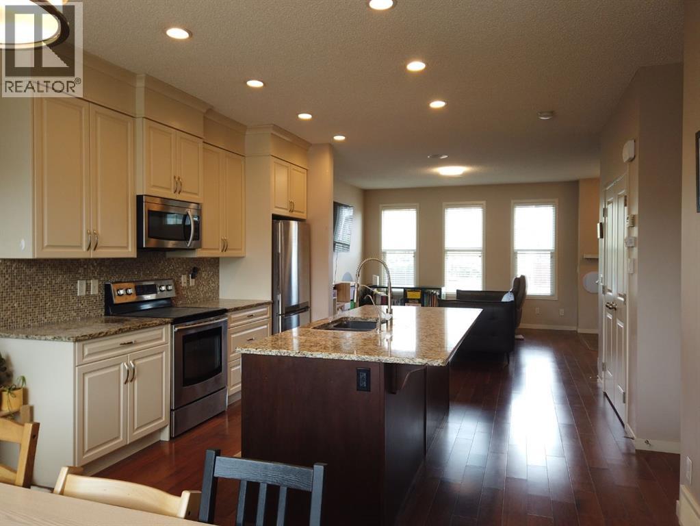 2064 New Brighton Grove Se, Calgary, Alberta  T2Z 1G1 - Photo 9 - A2314403