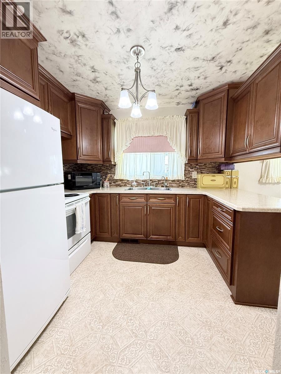 722 Washington Drive, Weyburn, Saskatchewan S4H 3C8 - Photo 7 - SK039660