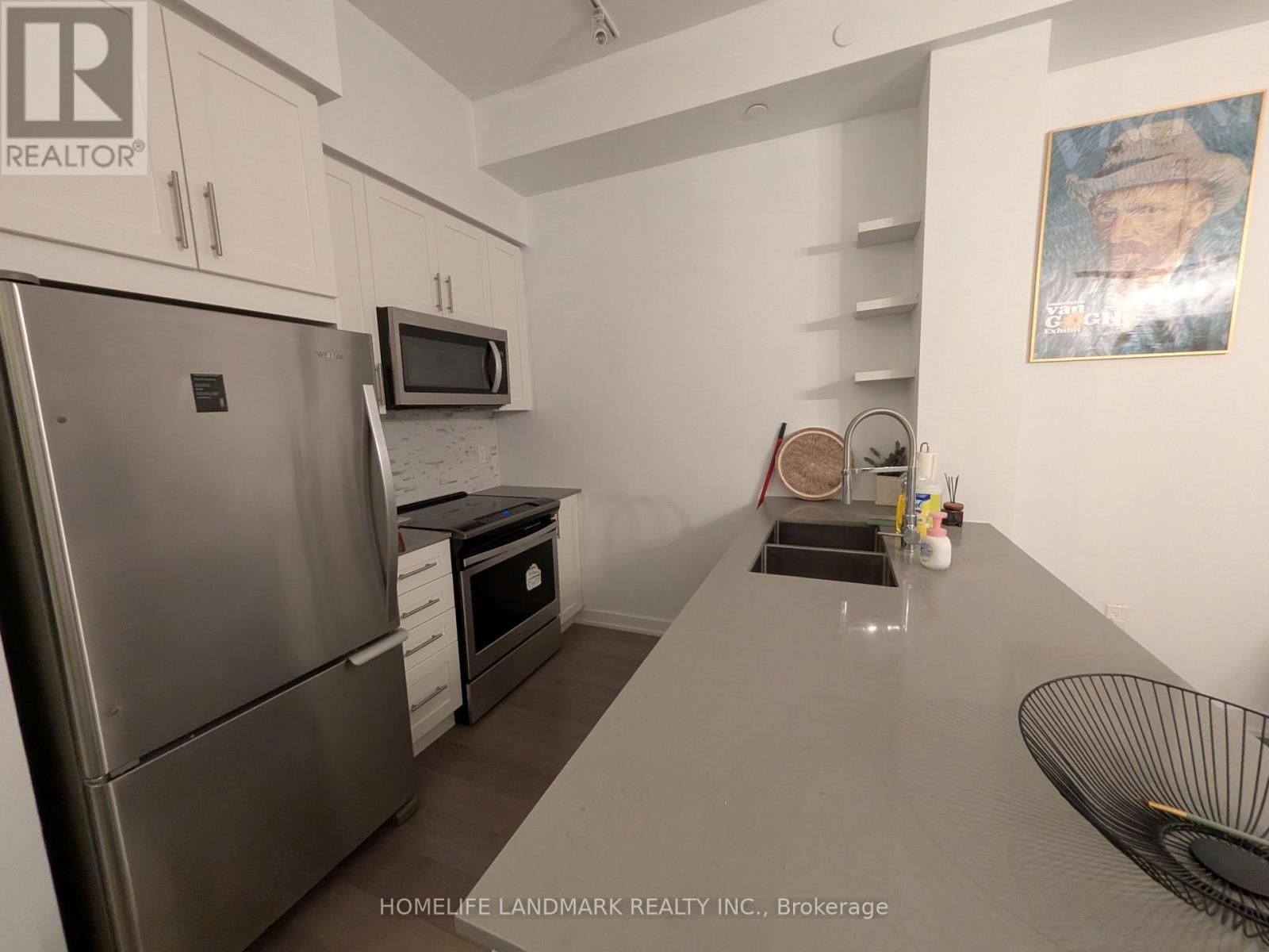 424 - 4055 Parkside Village Drive, Mississauga, Ontario L5B 0K8 - Photo 2 - W13453622