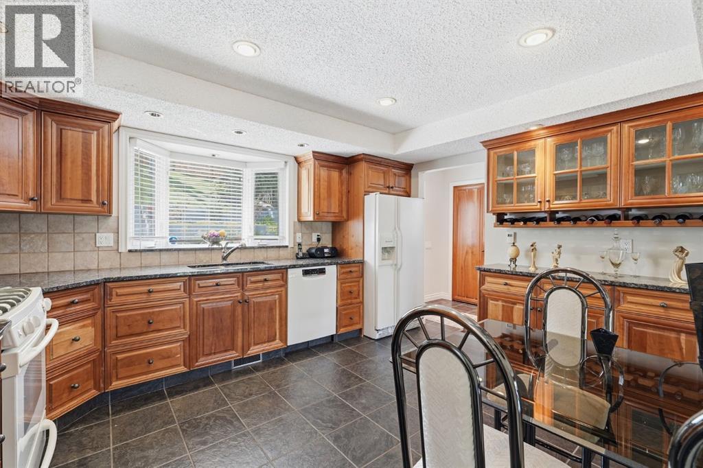 5807 Coach Hill Road Sw, Calgary, Alberta  T3H 1E3 - Photo 13 - A2314860