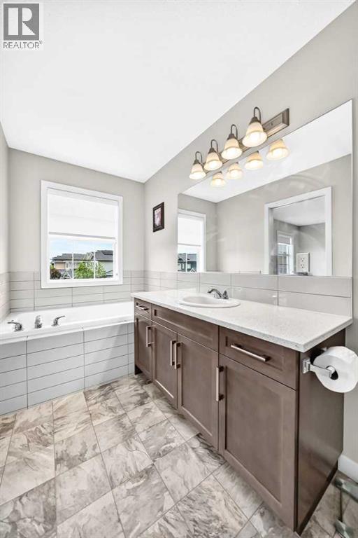 125 Bayside Loop Sw, Airdrie, Alberta  T4B 3E5 - Photo 30 - A2321391