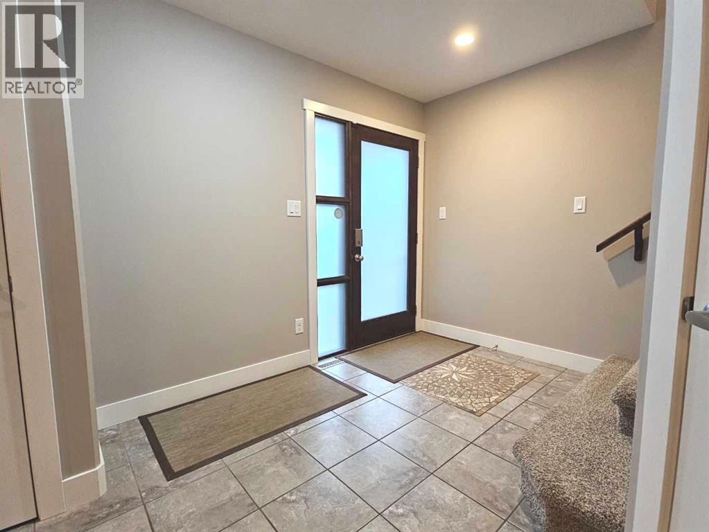 302 Sixmile Ridge S, Lethbridge, Alberta  T1K 5W8 - Photo 4 - A2320097