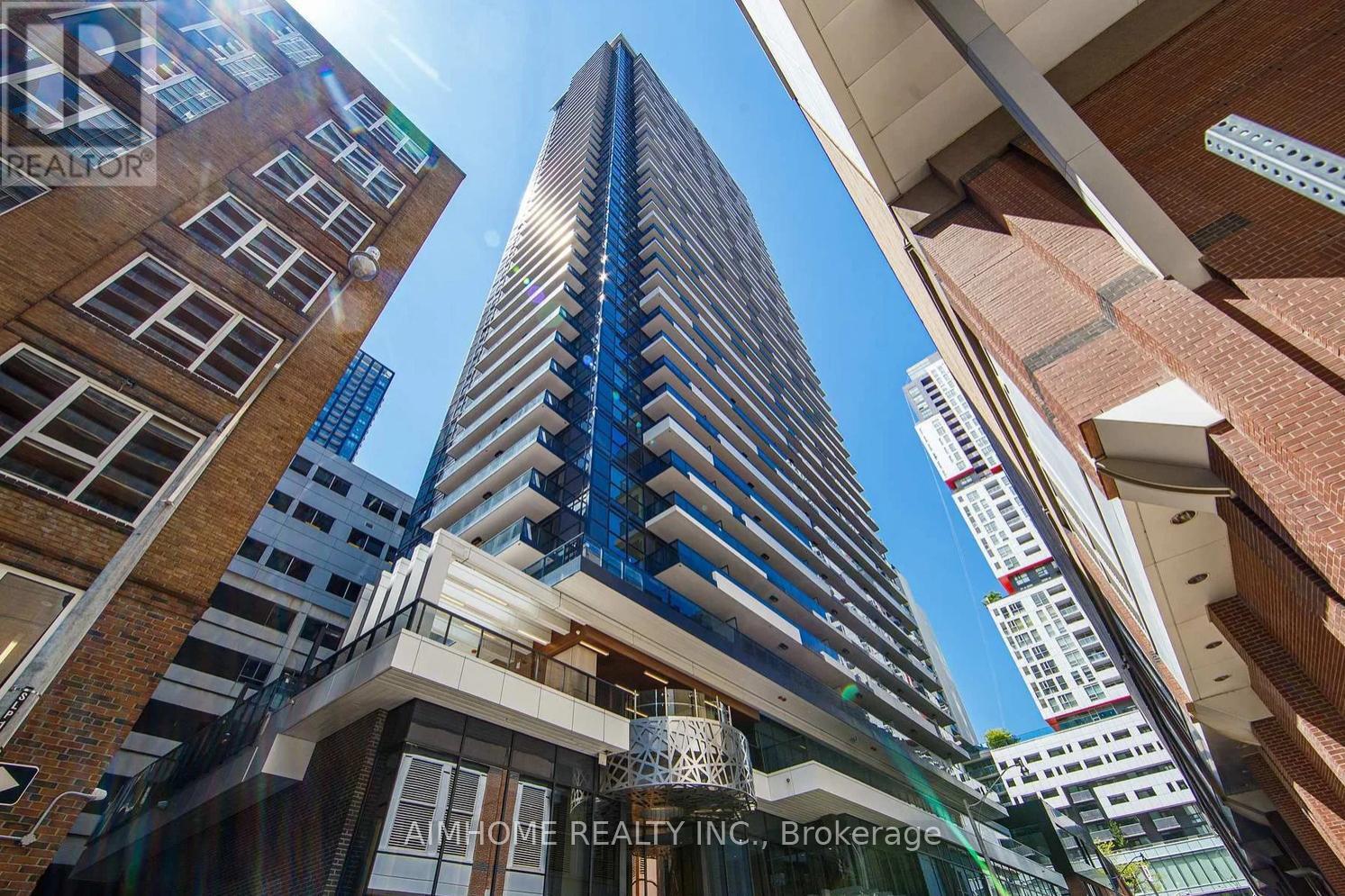 <div class="slider-price">$749,000</div><p>2205 - 38 Widmer Street, Toronto, Ontario</p>