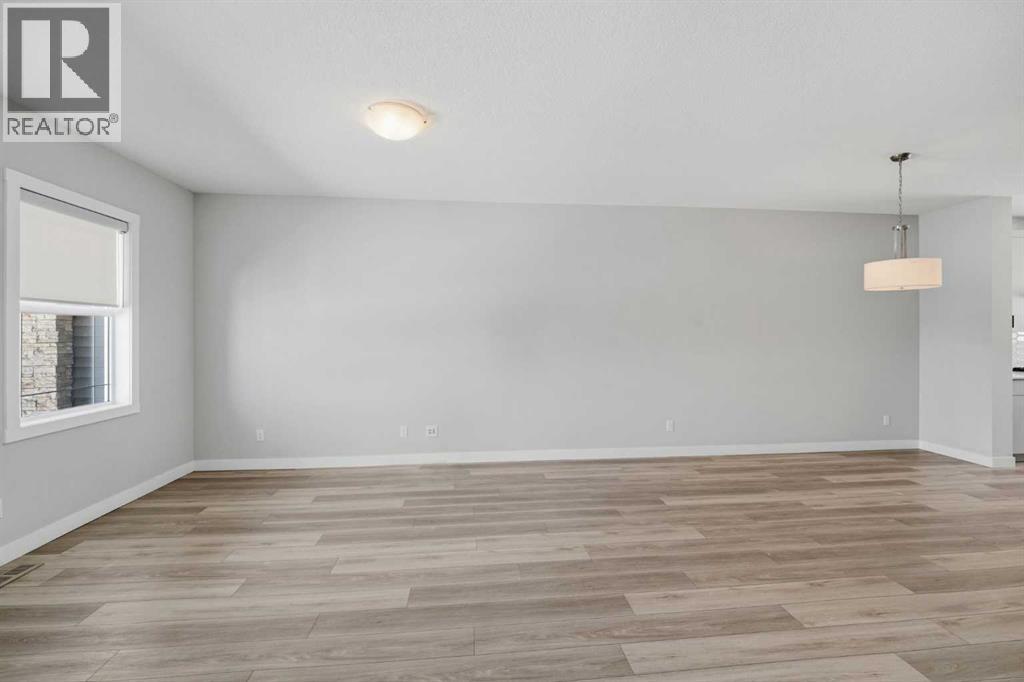 125 Edith Gate Nw, Calgary, Alberta  T3R 1Z2 - Photo 3 - A2321455