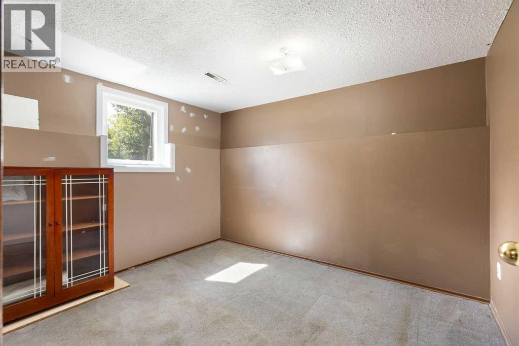 1016 Hunterdale Place Nw, Calgary, Alberta  T2K 4R7 - Photo 24 - A2320394