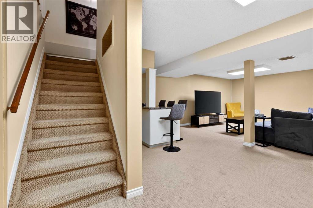 10540 Oakfield Drive SW, Calgary, Alberta  T2W 2A9 - Photo 25 - A2315874