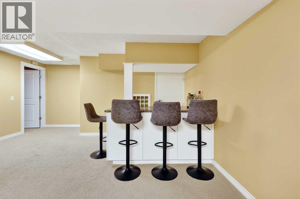 10540 Oakfield Drive SW, Calgary, Alberta  T2W 2A9 - Photo 30 - A2315874