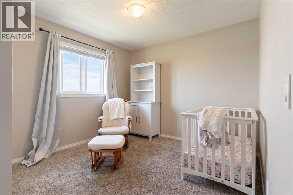 126 Morningside Point Sw, Airdrie, Alberta  T4B 3M3 - Photo 31 - A2321055