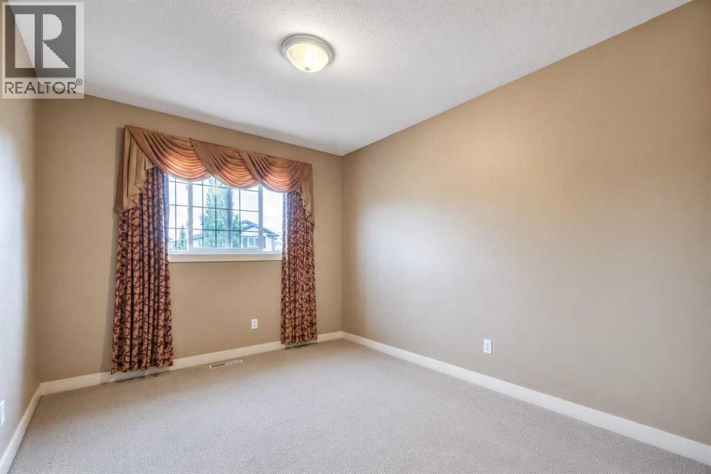 113 Cove Hill, Chestermere, Alberta  T3A 6B5 - Photo 40 - A2321705