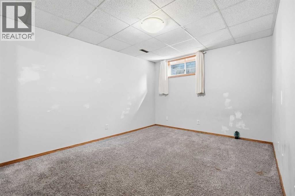 201 Sierra Morena Circle SW, Calgary, Alberta  T3H 2W8 - Photo 34 - A2321592