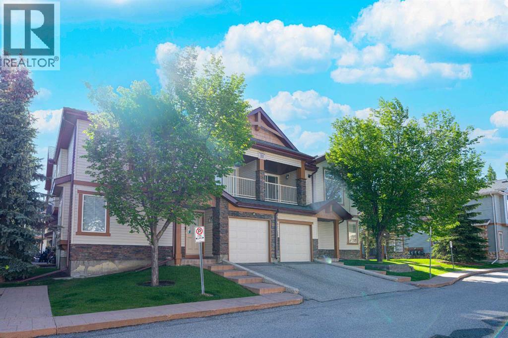 203, 11 Panatella Landing Nw, Calgary, Alberta  T3K 0K8 - Photo 3 - A2319198