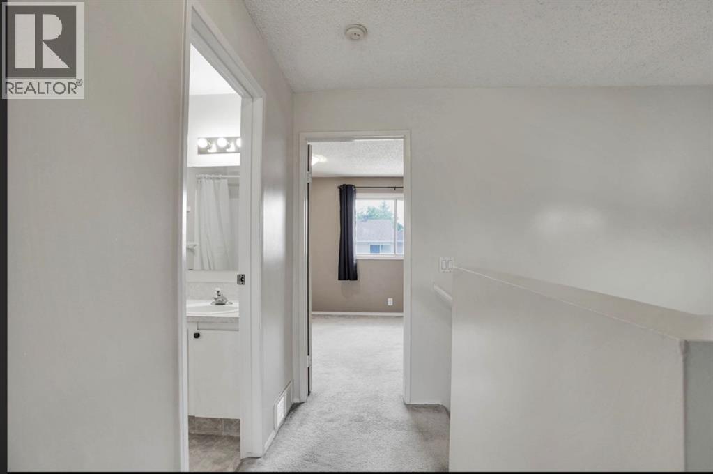 164 Woodsman Lane, Calgary, Alberta  T2W 4Z6 - Photo 15 - A2321633