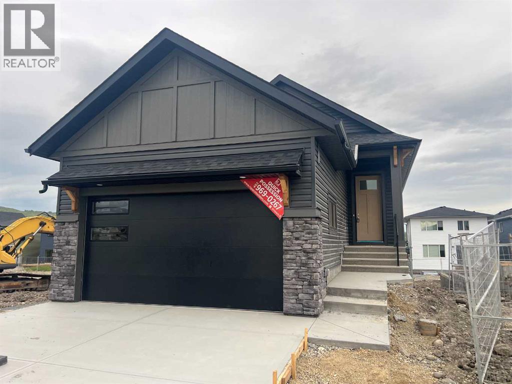109 Quartz Crescent, Cochrane, Alberta T4C 3G2 - Photo 5 - A2321311