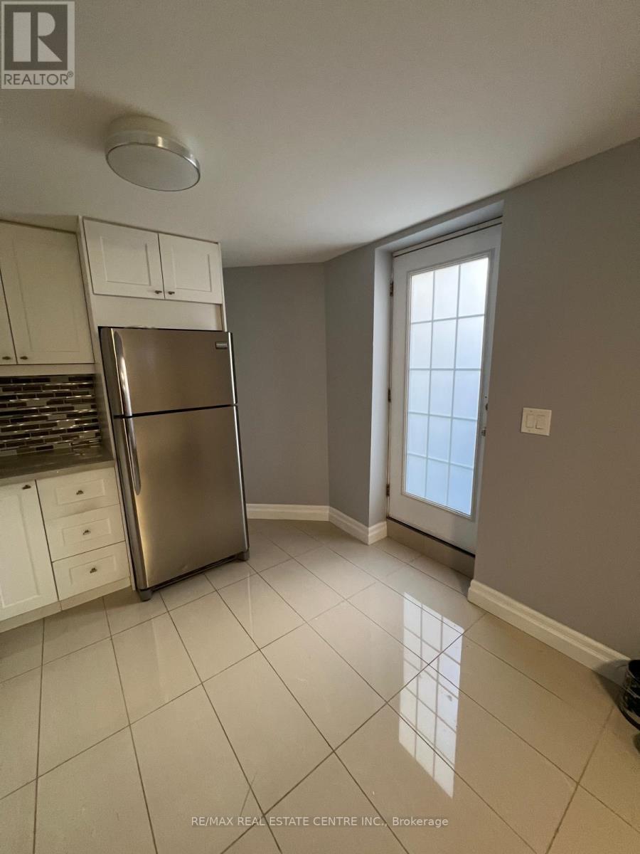 BASEMENT - 230-1 HUNTINGFORD GATE, Milton, Ontario