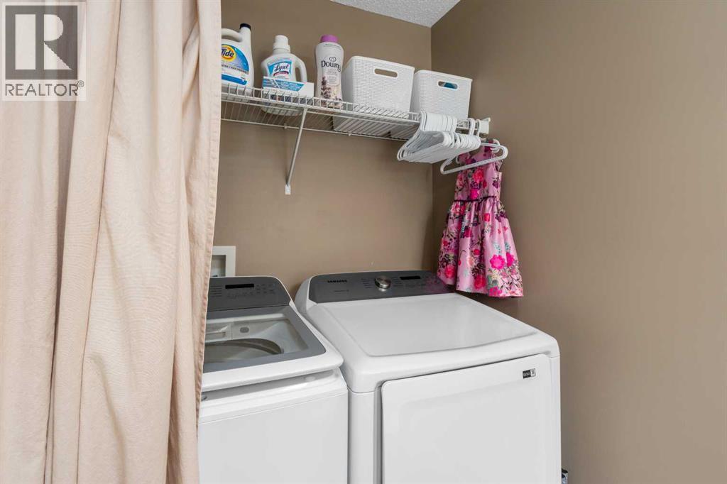 2067 Luxstone Boulevard SW, Airdrie, Alberta  T4B 0J8 - Photo 12 - A2322057
