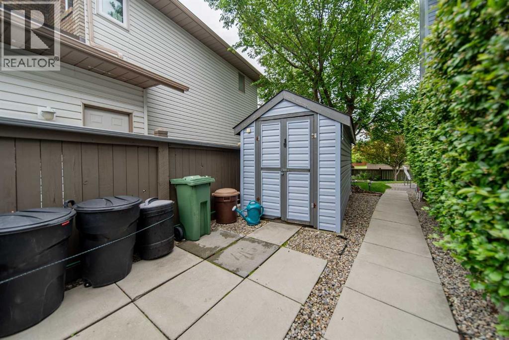 76 Sunset Crescent, Okotoks, Alberta  T1S 1P5 - Photo 43 - A2312229