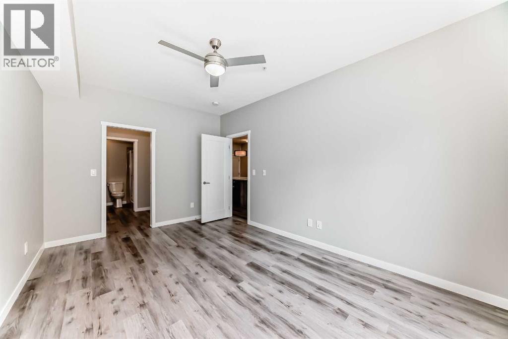 108, 71 Shawnee Common Sw, Calgary, Alberta  T2Y 0R2 - Photo 23 - A2317711