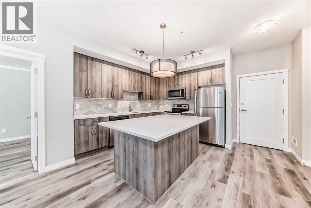 108, 71 Shawnee Common Sw, Calgary, Alberta  T2Y 0R2 - Photo 6 - A2317711