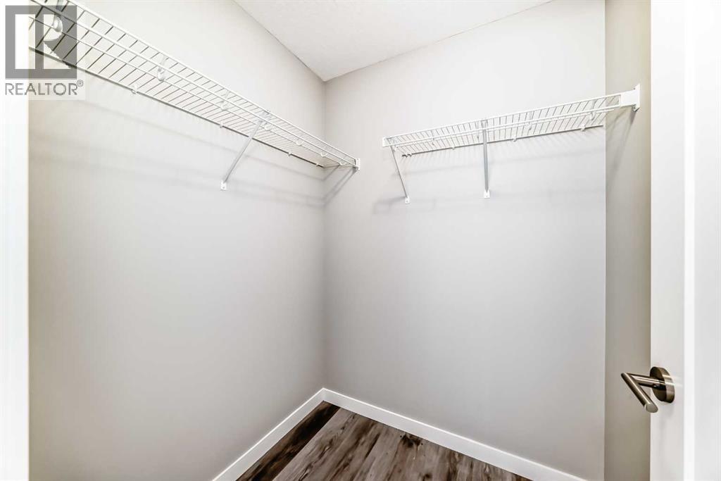 108, 71 Shawnee Common Sw, Calgary, Alberta  T2Y 0R2 - Photo 31 - A2317711