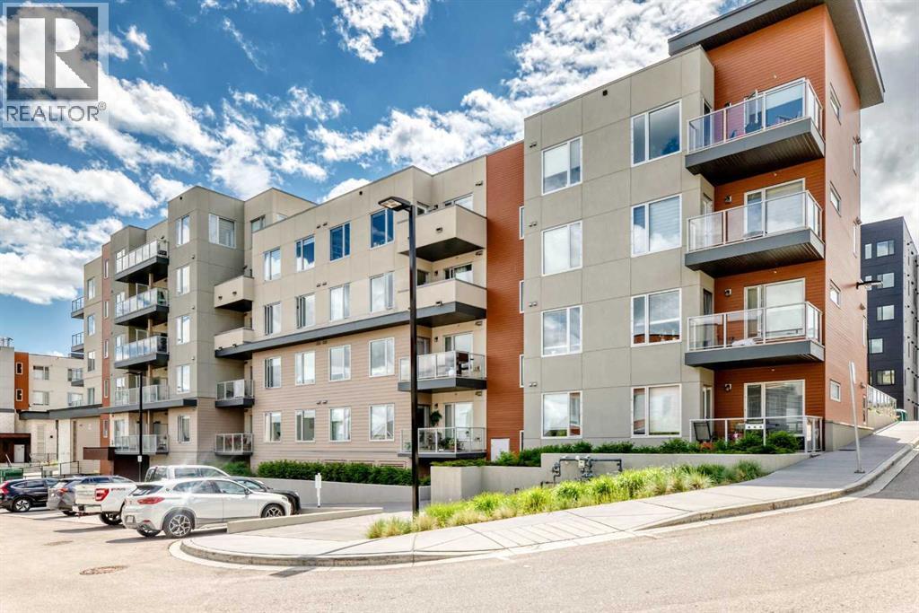 108, 71 Shawnee Common Sw, Calgary, Alberta  T2Y 0R2 - Photo 3 - A2317711