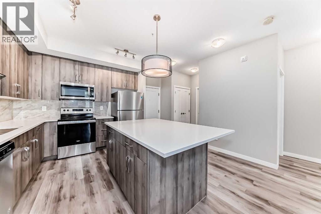 108, 71 Shawnee Common Sw, Calgary, Alberta  T2Y 0R2 - Photo 8 - A2317711