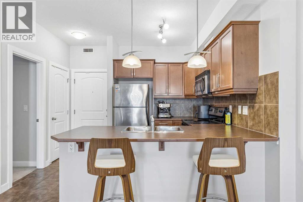 306, 15304 Bannister Road Se, Calgary, Alberta  T2X 0M8 - Photo 5 - A2321804