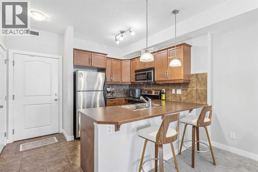 306, 15304 Bannister Road Se, Calgary, Alberta  T2X 0M8 - Photo 4 - A2321804