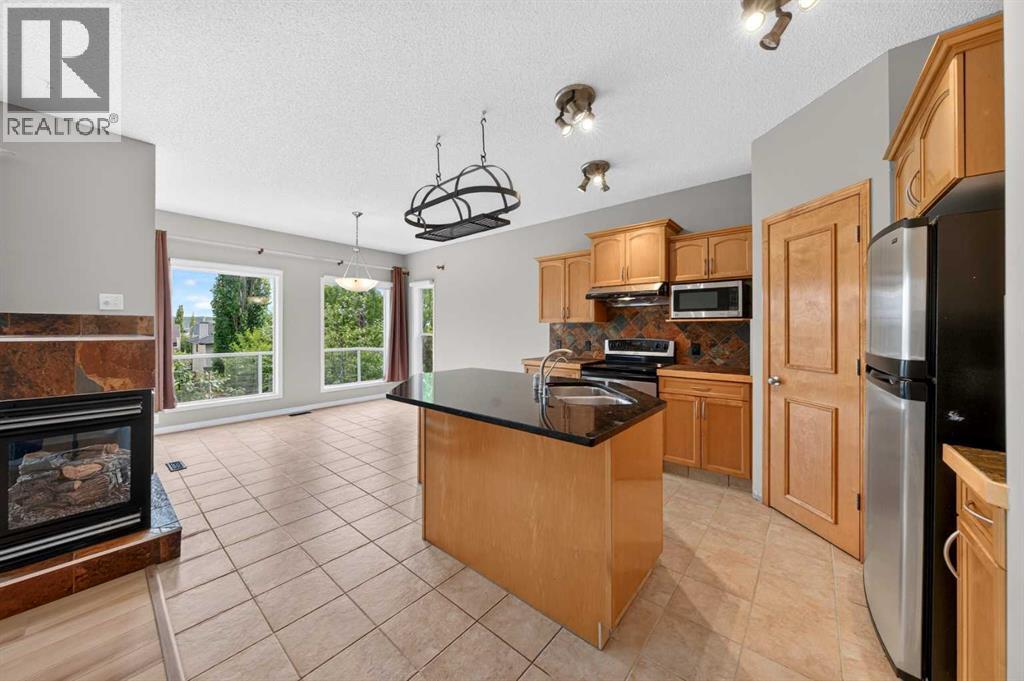 37 Tuscany Meadows Common NW, Calgary, Alberta  T3L 2L3 - Photo 8 - A2321196