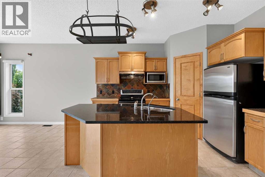 37 Tuscany Meadows Common NW, Calgary, Alberta  T3L 2L3 - Photo 7 - A2321196