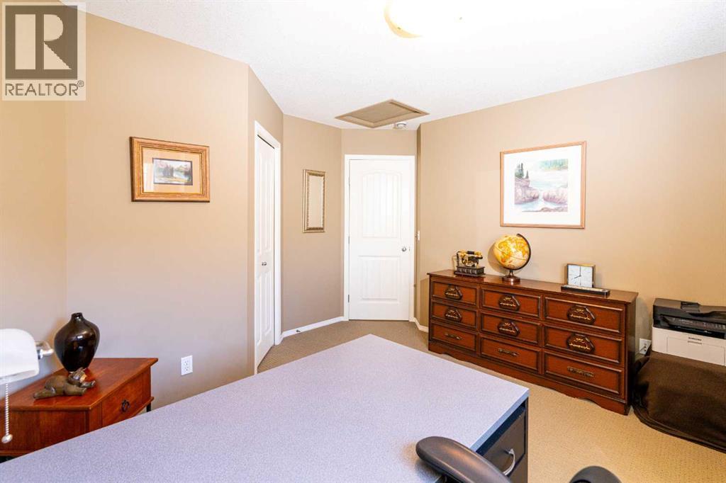 203, 11 Panatella Landing Nw, Calgary, Alberta  T3K 0K8 - Photo 24 - A2319198