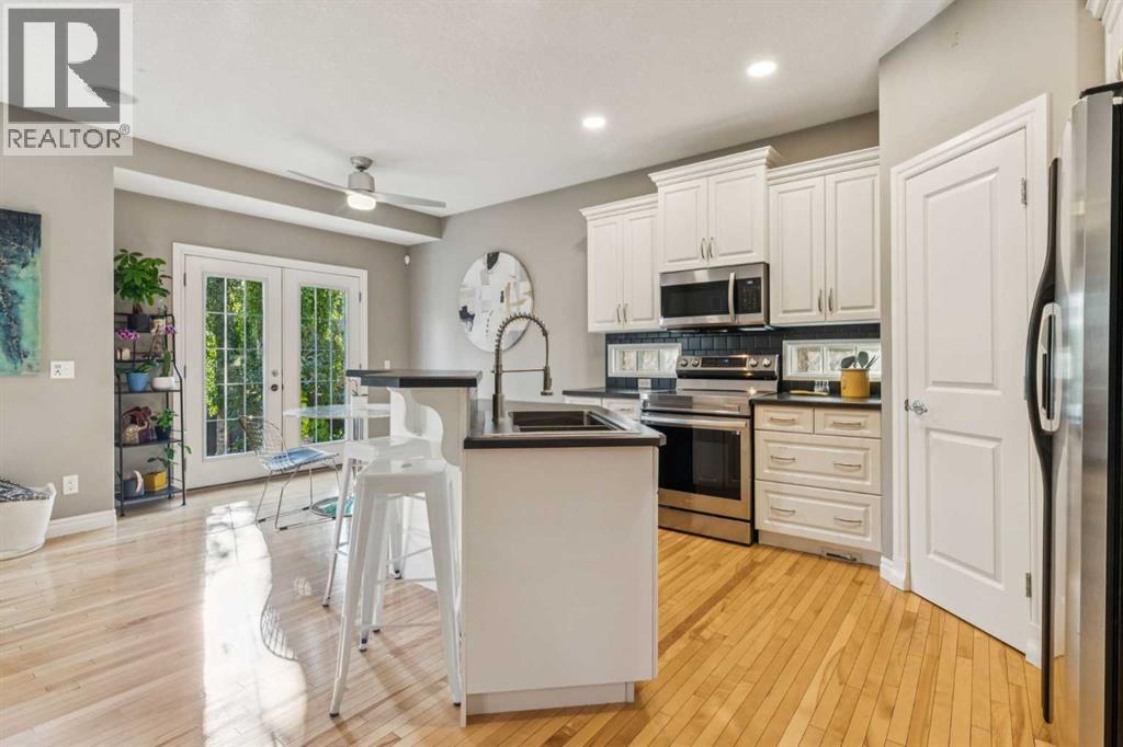 58 Cougar Plateau Way Sw, Calgary, Alberta  T3H 5S5 - Photo 6 - A2322134
