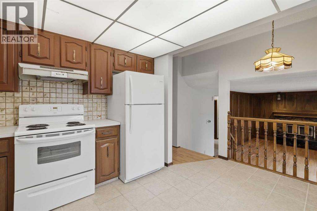 27 Woodgreen Place Sw, Calgary, Alberta  T2W 4A3 - Photo 13 - A2321722