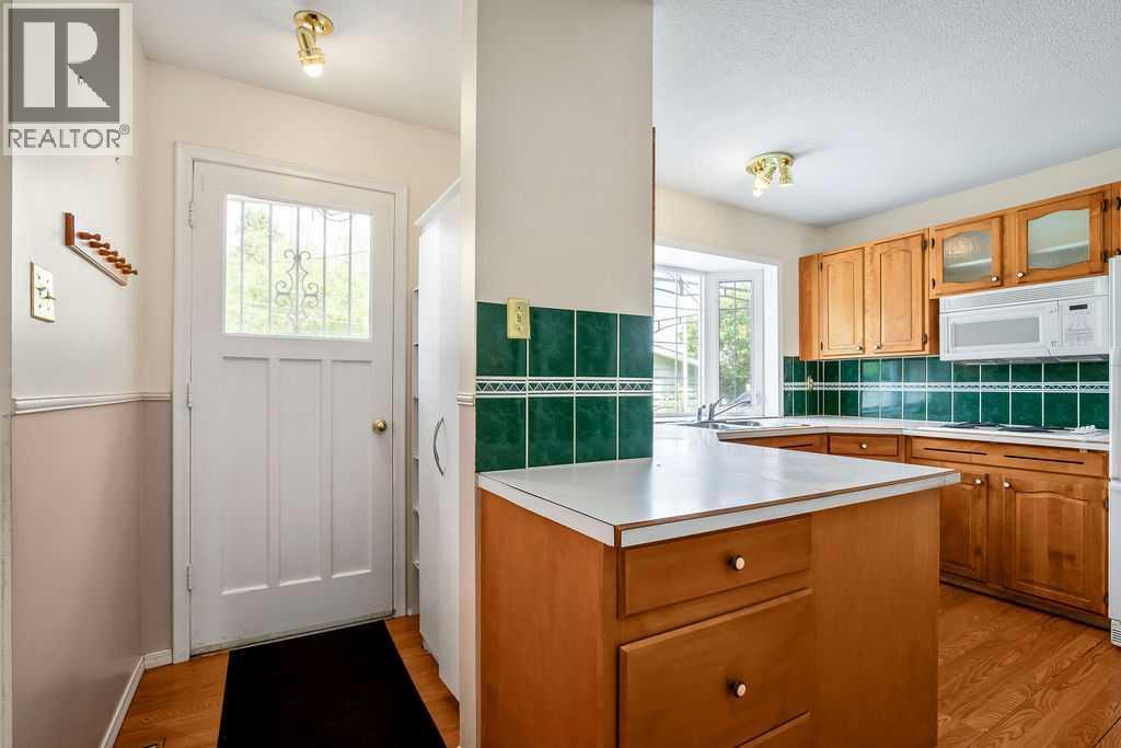 1112 Lake Sylvan Place SE, Calgary, Alberta  T2J 2P6 - Photo 13 - A2320598