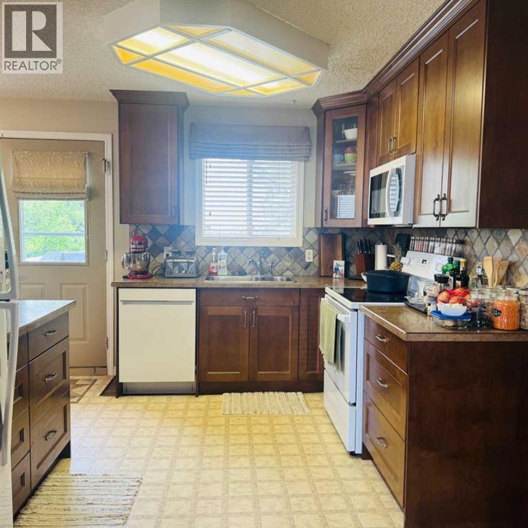 705 10 Avenue Se, High River, Alberta T1V 1K3 - Photo 14 - A2319479