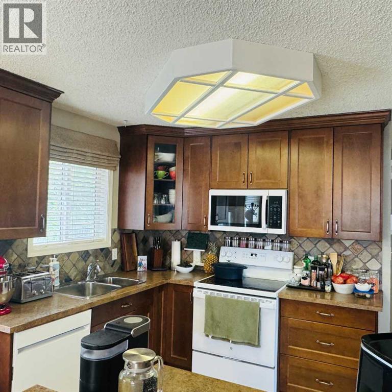 705 10 Avenue Se, High River, Alberta T1V 1K3 - Photo 10 - A2319479