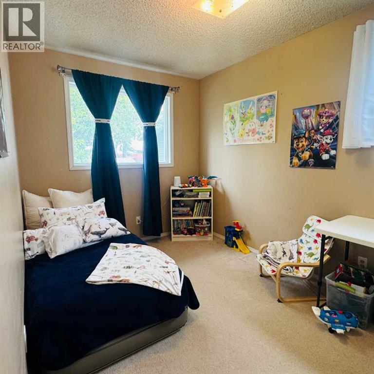 705 10 Avenue Se, High River, Alberta T1V 1K3 - Photo 15 - A2319479