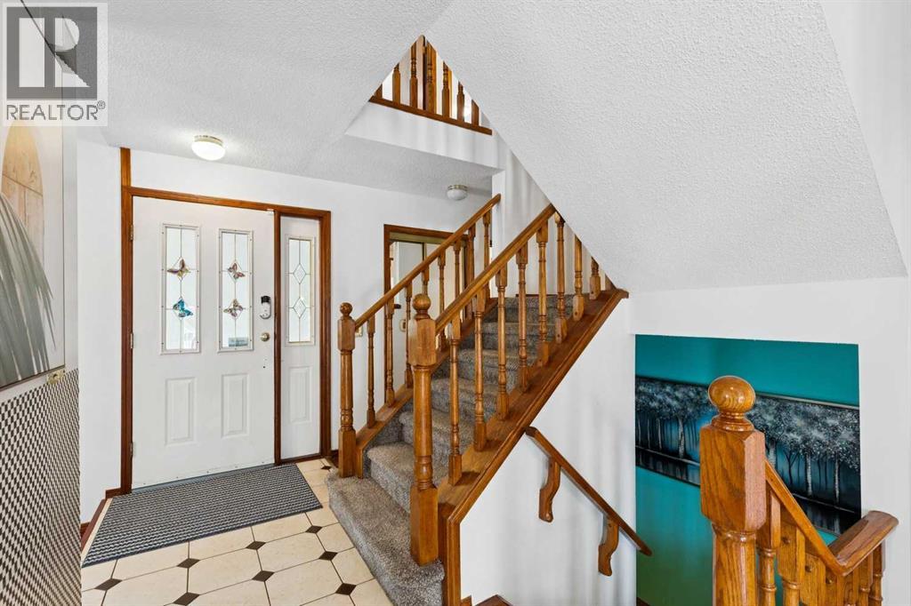 8971 Scurfield Drive Nw, Calgary, Alberta  T3L 1K6 - Photo 5 - A2322573