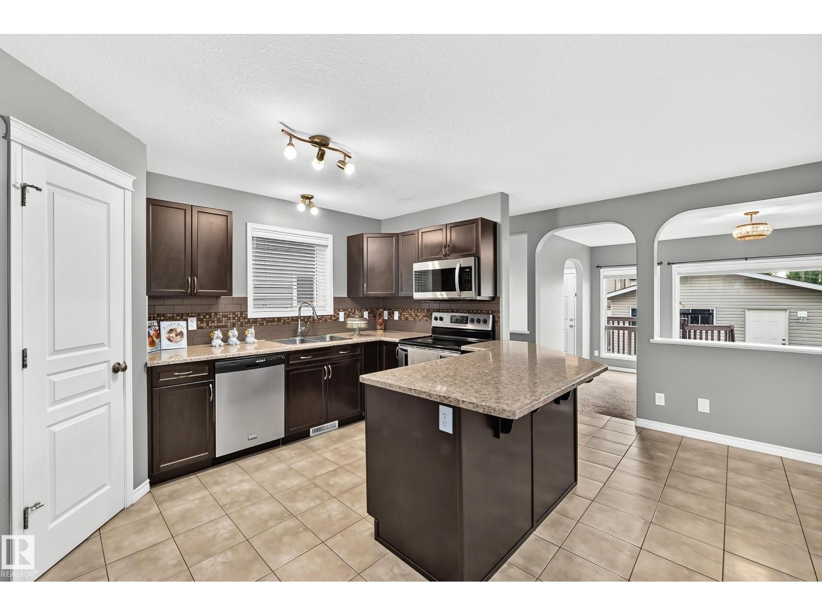 430 Hemingway Rd NW, Edmonton, Alberta  T6M 0J8 - Photo 9 - E4494567