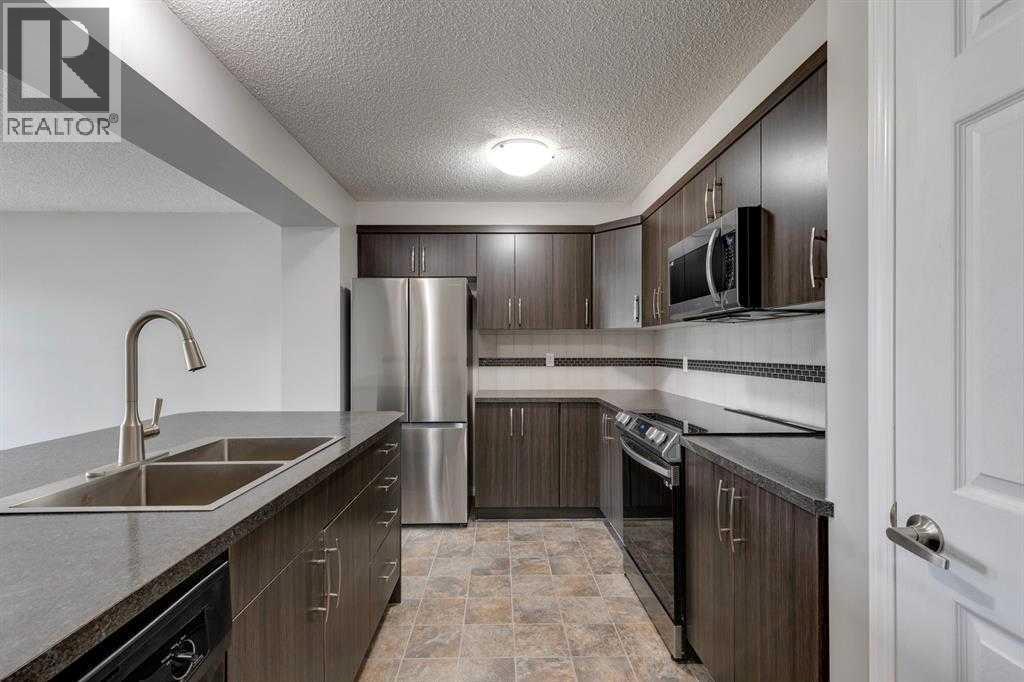113 Windstone Avenue SW, Airdrie, Alberta  T4B 3R3 - Photo 6 - A2308768