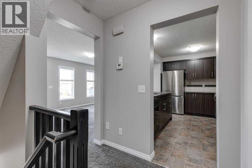 113 Windstone Avenue SW, Airdrie, Alberta  T4B 3R3 - Photo 3 - A2308768