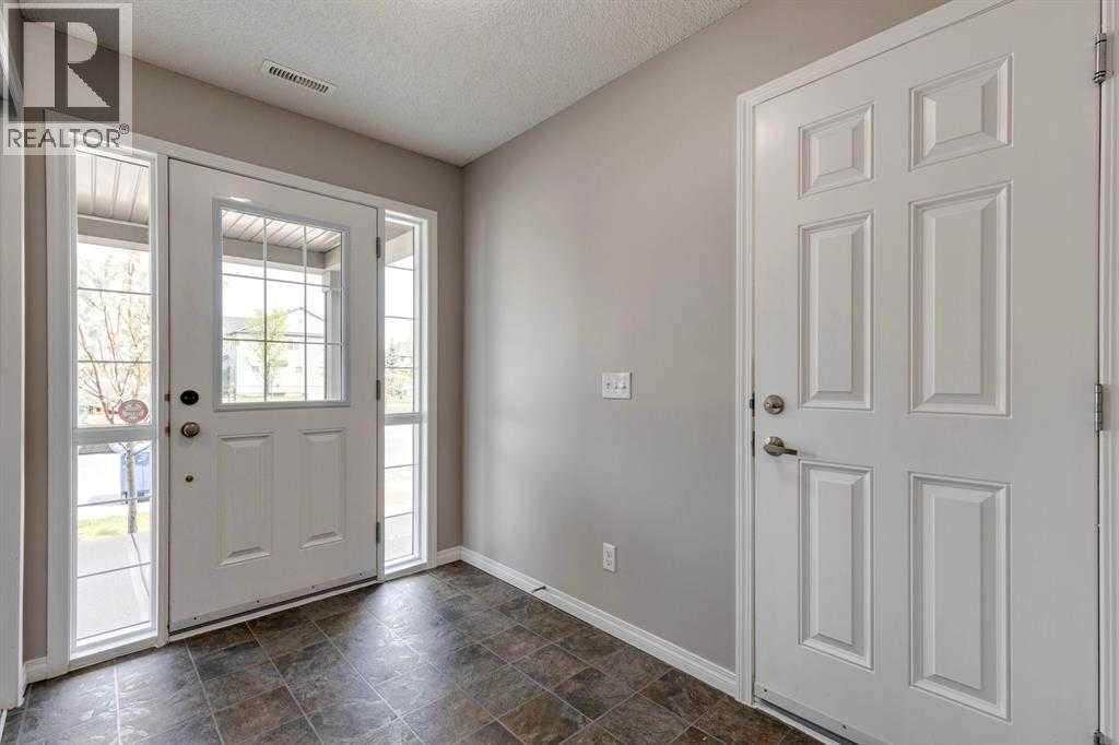 113 Windstone Avenue SW, Airdrie, Alberta  T4B 3R3 - Photo 2 - A2308768