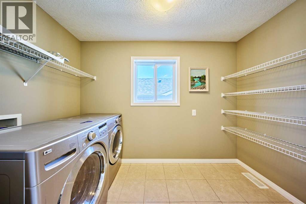 15 Silverado Saddle Court Sw, Calgary, Alberta  T2X 0H9 - Photo 42 - A2318913