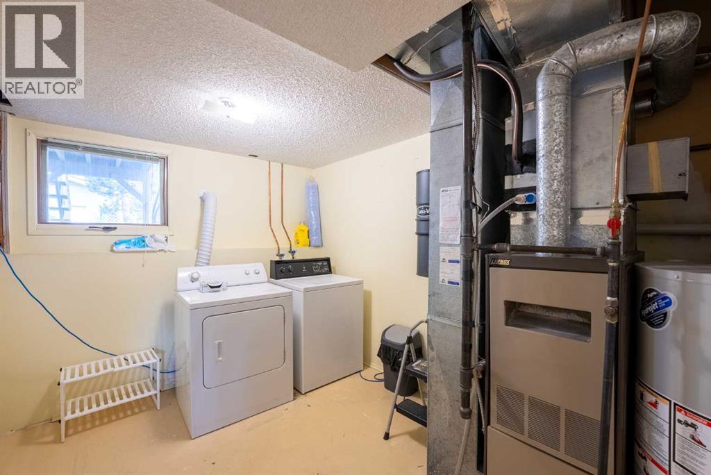 23 Selkirk Road W, Lethbridge, Alberta  T1K 4N4 - Photo 20 - A2320330