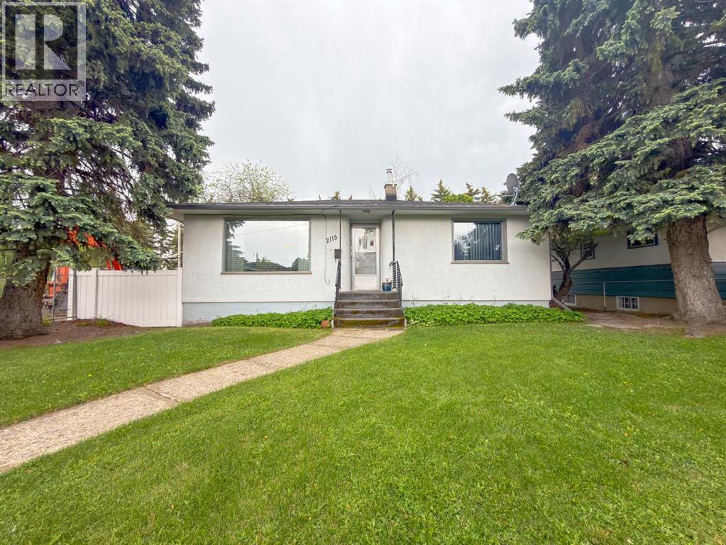 2115 Halifax Crescent Nw, Calgary, Alberta  T2M 4C8 - Photo 27 - A2319603